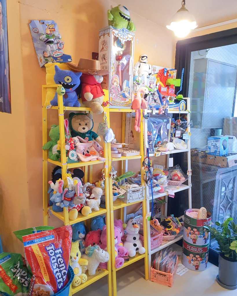A close-up of some of the shelves with toys and stuffed animals